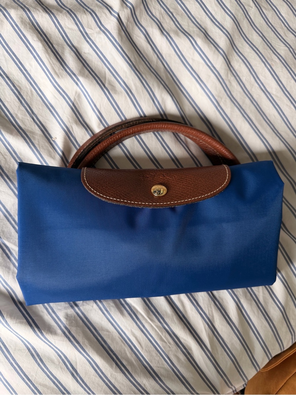 Longchamp foldable duffel in brand new condition. Royal blue.